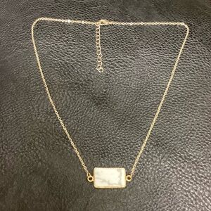 Gold Necklace With Marble Pendant